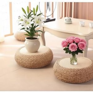 Handwoven willow floor pouf with solid wood frame, minimalist style for living room